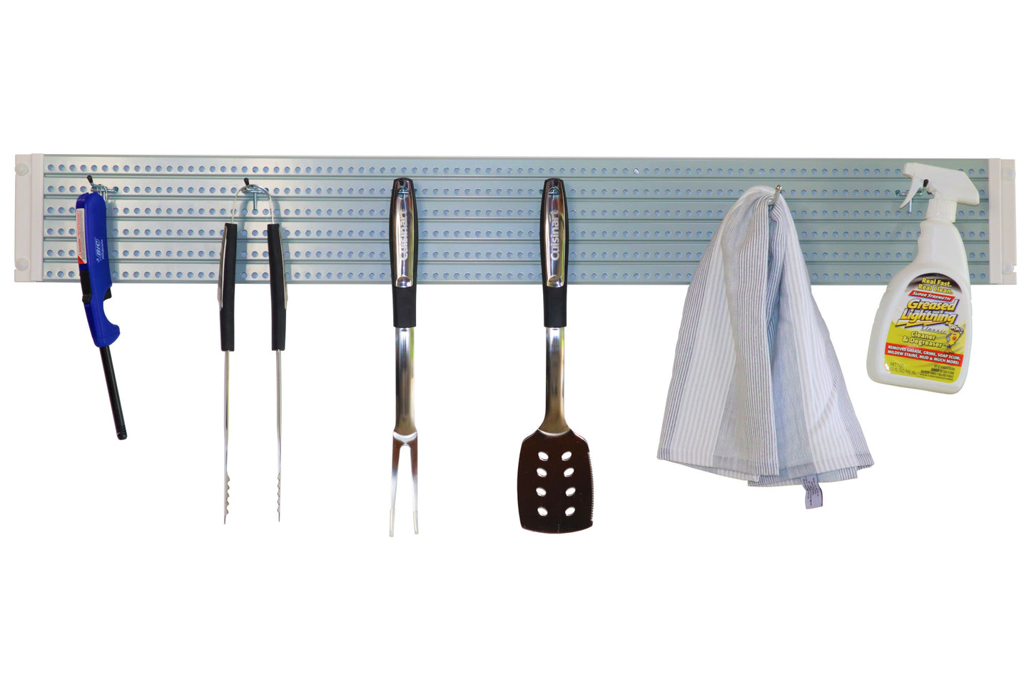 Image of a gray with white trim Handypeg pegboard with tools for grilling and cleaning hanging from attached pegs.