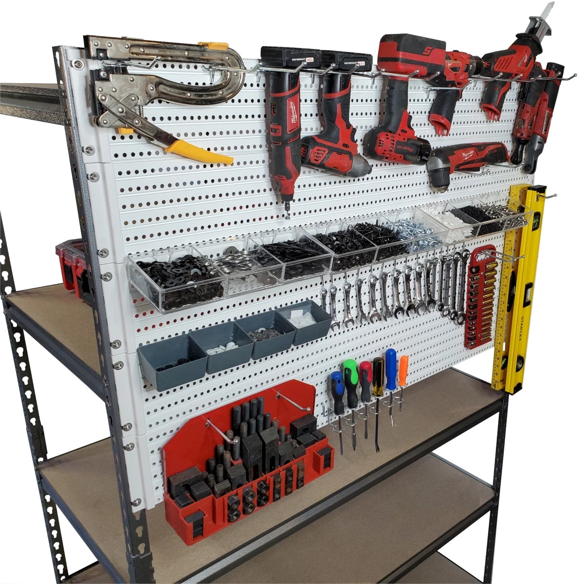 Image of five white with white trim Handypeg pegboards mounted to the side of a metal shelving unit with several tools and organizing trays attached.